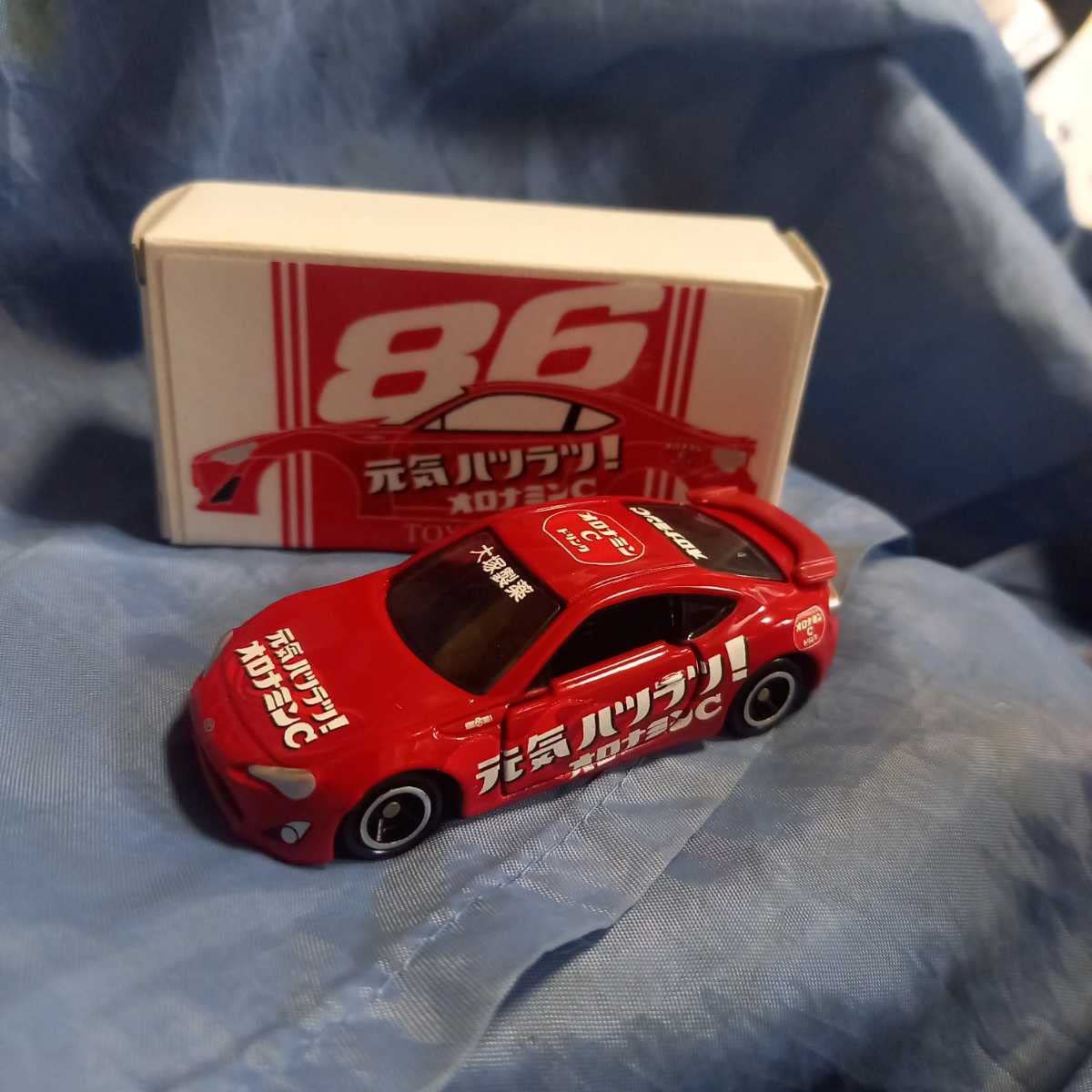 Amazon | トミカ ミニカー86 カーラ 特注 元気ハツラツ オロナミンC